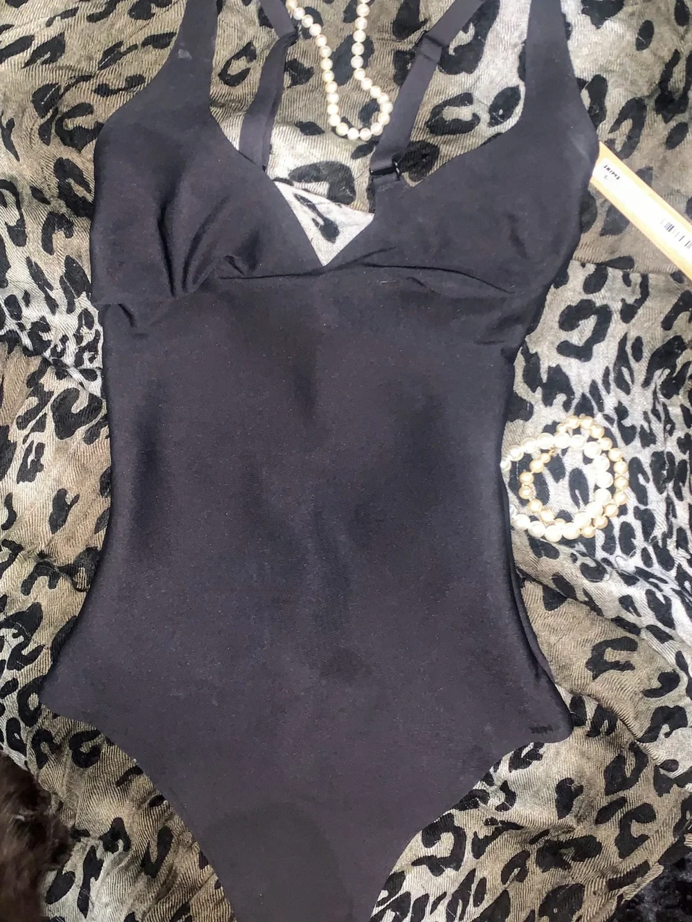 SKIMS Black Sculpting Bodysuit with Light Bust Support